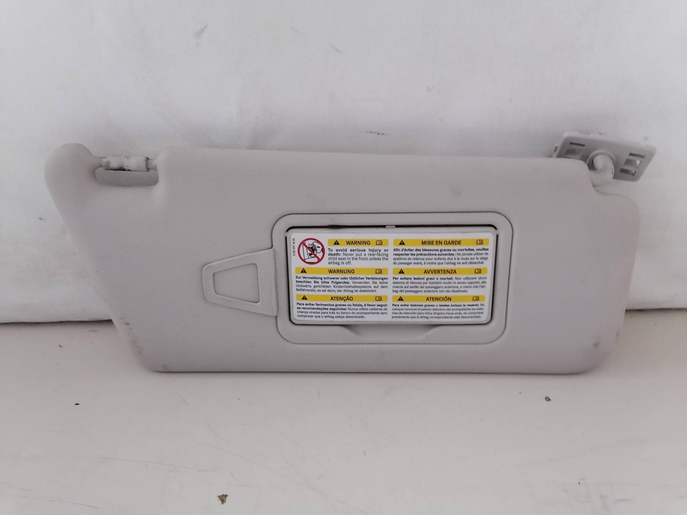 Aletta parasole parabrezza dx.